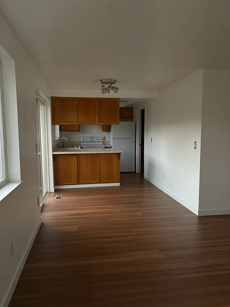 Living room into kitchen - 5092 Skyline Village Loop S #5092