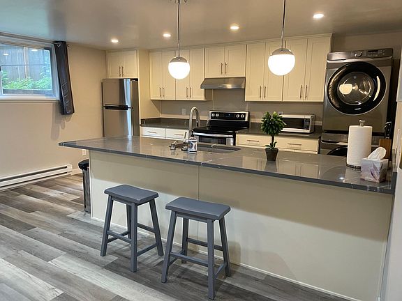 Bar facing open kitchen