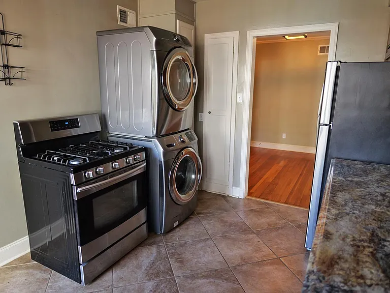 Samsung gas stove. High-end Samsung washer and dryer.