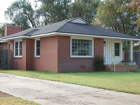 Long paved driveway
