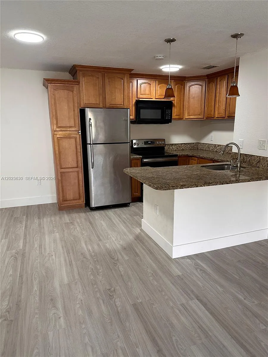 Photo 2 of 9 - 15619 SW 73rd Circle Ter #104 - Miami, FL Building Photo - 15619 SW 73rd Circle Ter #104