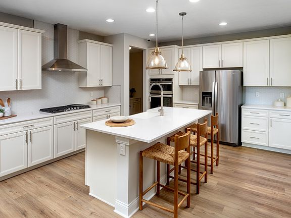 Kitchen with Center Island and Built-in Appliances