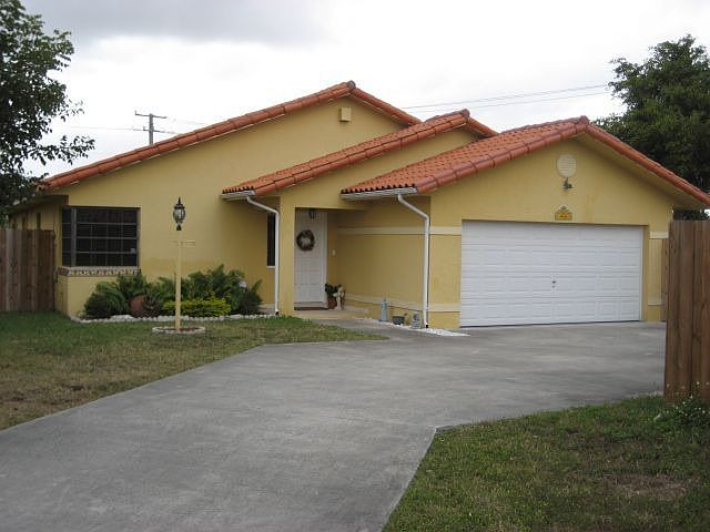 Large Driveway Leading to House