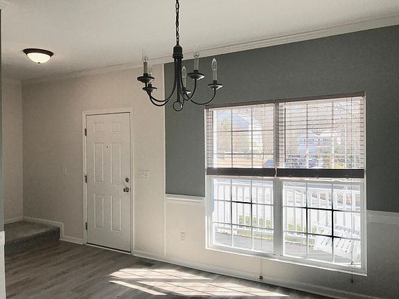 Front Entrance and Dining Room (approximate 13' x 10')