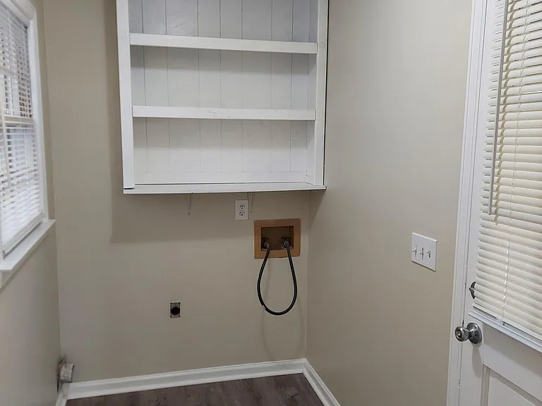 Laundry Room W/ Space for Supplies