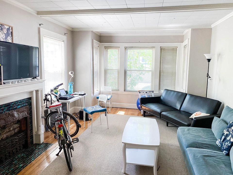 HUGE Living Room w/ decorative fireplace
