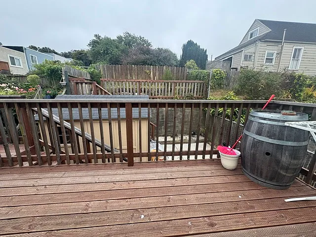 Deck to back yard and garage.