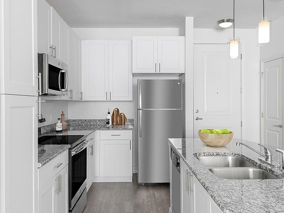 Experience culinary excellence in this modern kitchen with top-of-the-line finishes.