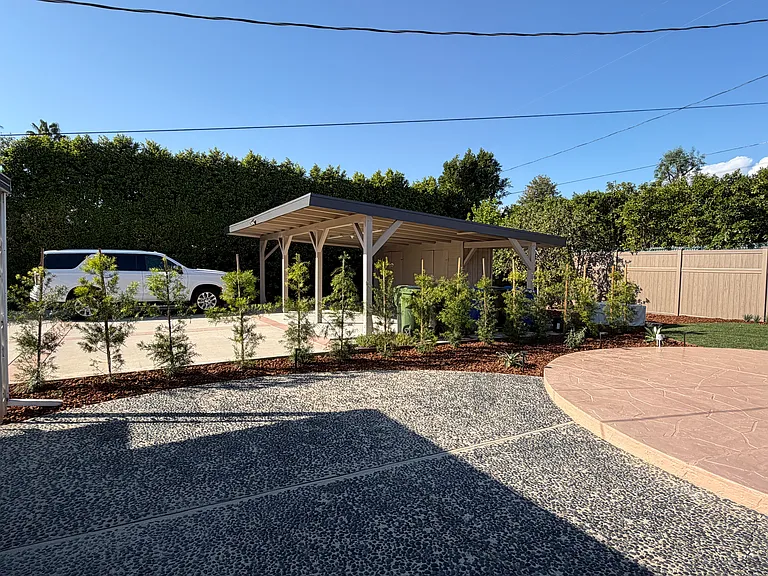 Backyard, view of carport area