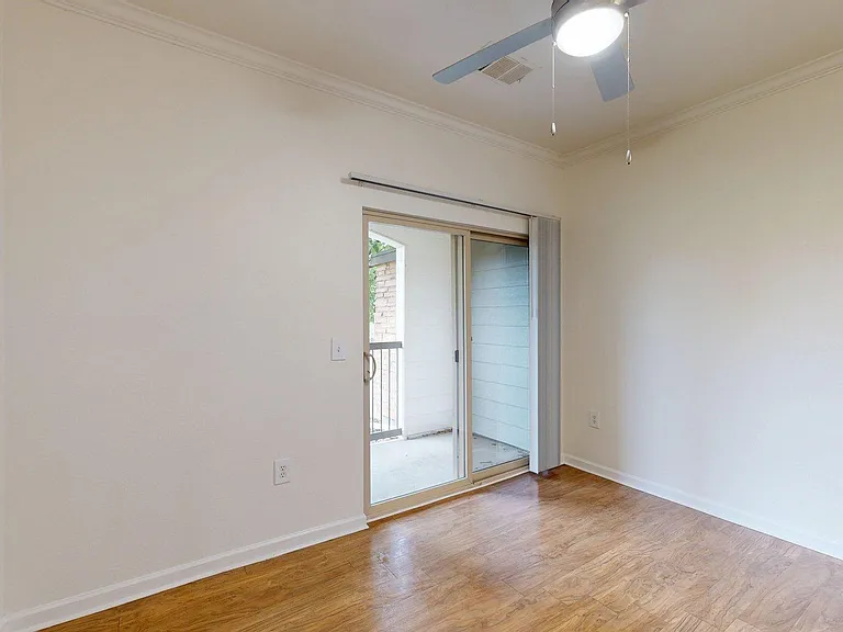 Apartment Living Room with wood-style floors and Patio/Balcony.