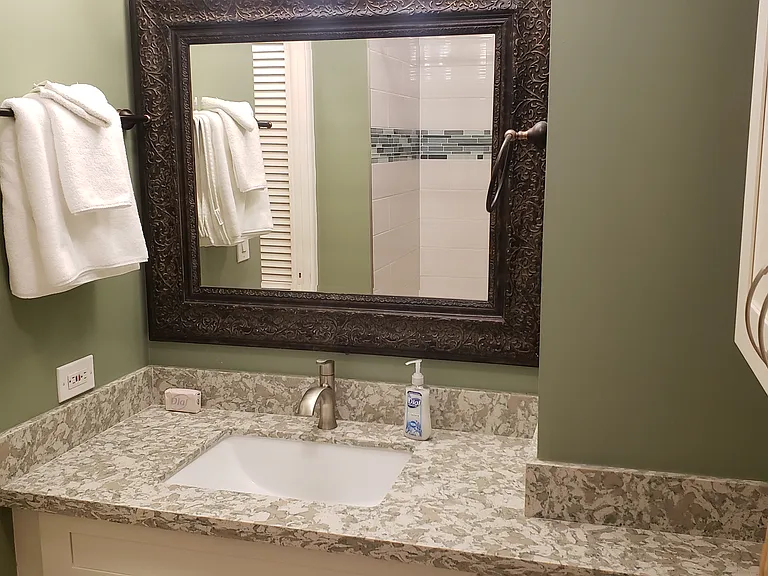 Remodeled Natural Stone bathroom