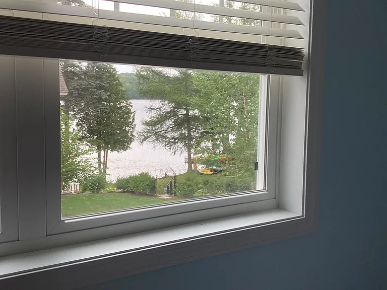 view of lake from bedroom