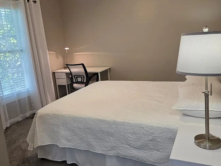 Spacious furnished bedroom with private bathroom
Private bedroom with ensuite bathroom
Bright furnished master bedroom