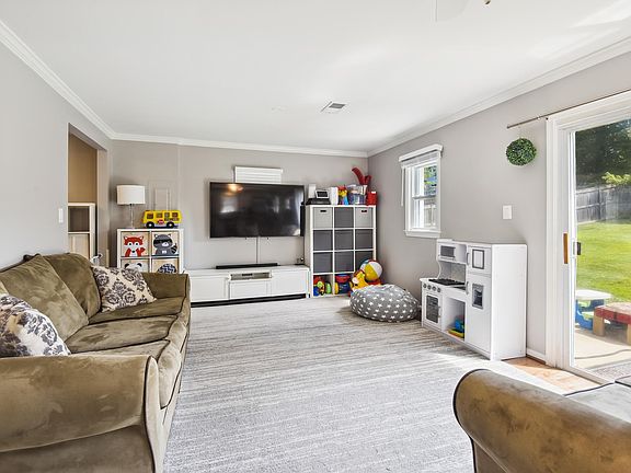 Living room opens to backyard