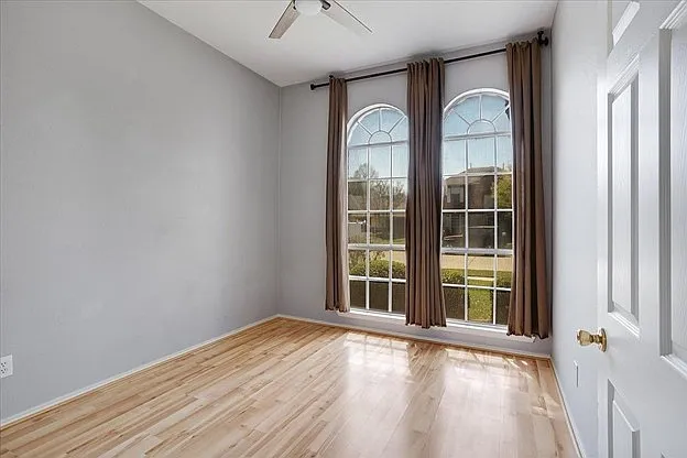 The room to the right of the entrance can be used as a study room, home office, or dining room. Dimensions: 11 x 10