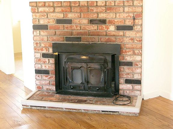 Hardwood Floors and Fireplace