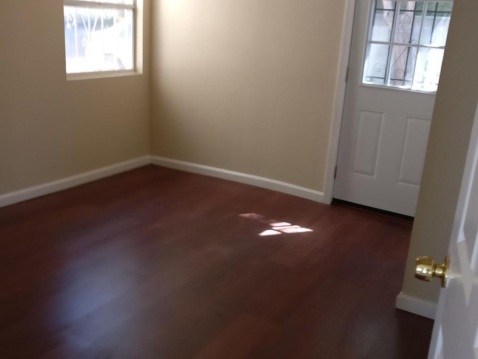 bedroom with door to backyard