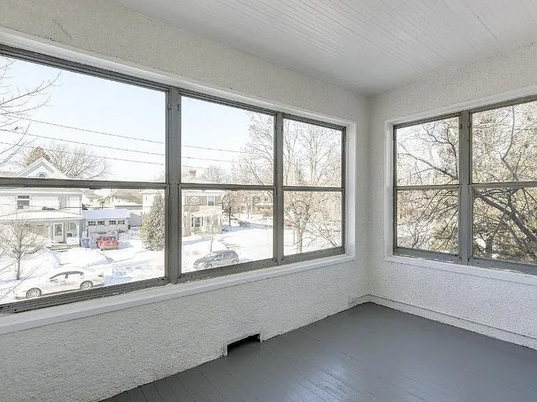Charming 3 season porch, updated windows and heating source