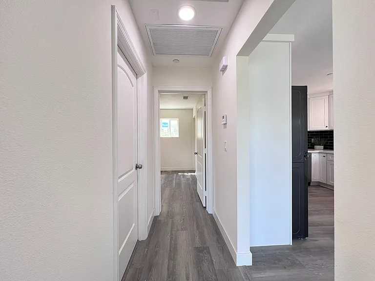 hallway to bedrooms and bathrooms