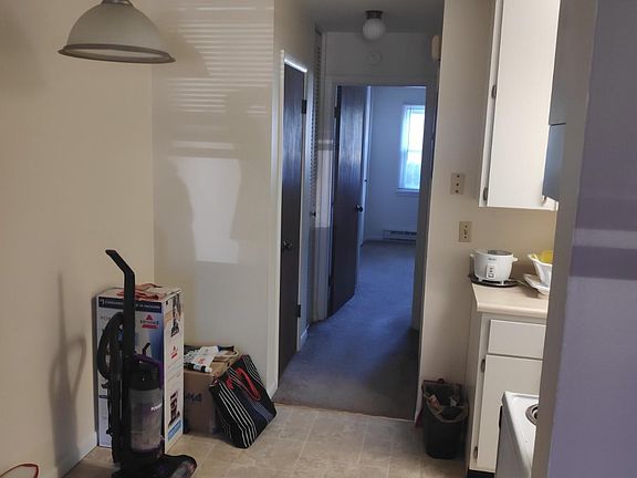Corridor linking hall, kitchen, bathroom and bedroom