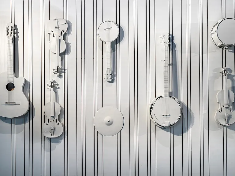 An artful tribute to Music City's roots, showcasing the instruments that shaped Nashville's sound.