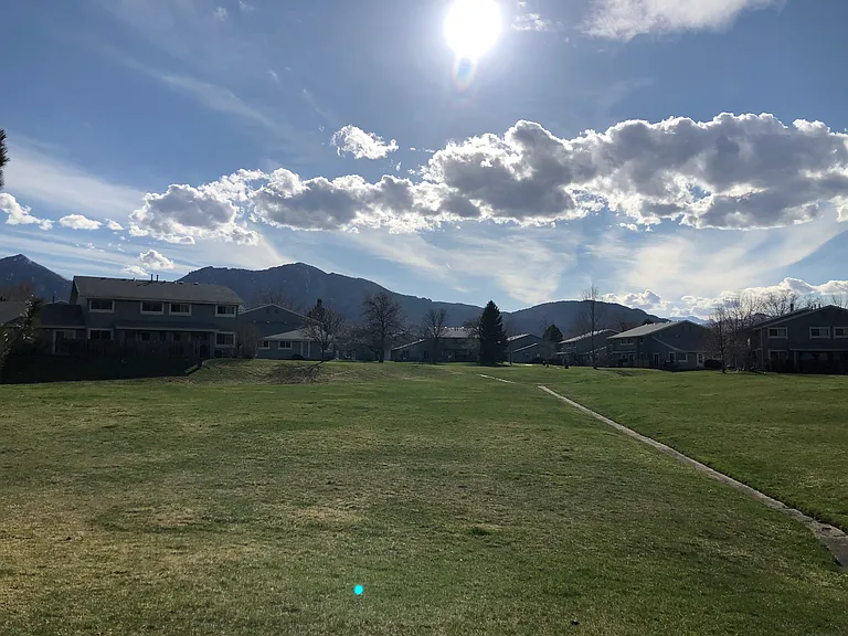 Shared green space area with flatiron views and direct access to bike-path