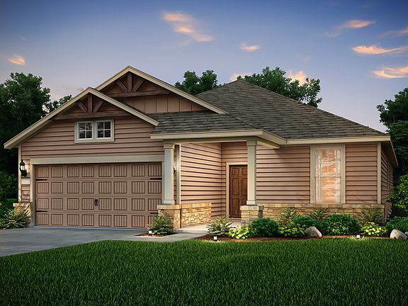 The Emory, a one-story home with 2-car garage, shown with Home Exterior 40