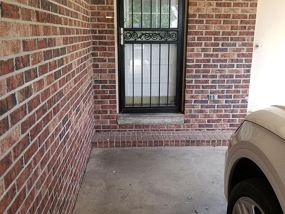 Two short steps from carport