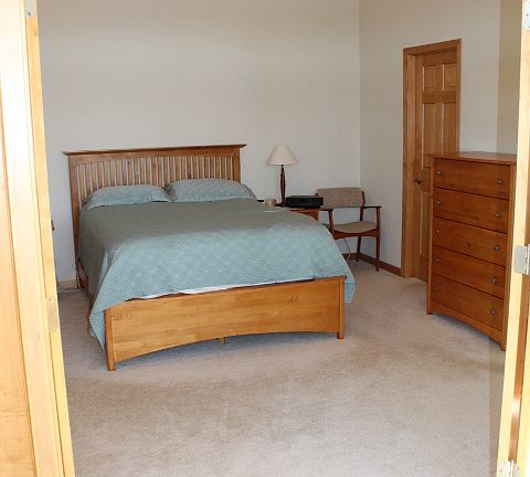 Main floor vaulted master suite with huge walk-in closet and master bath.