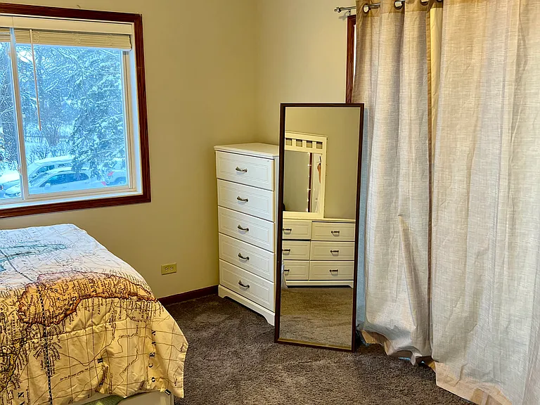 Room # 5 with walk-in closet and sliders to private balcony $1000 per month.