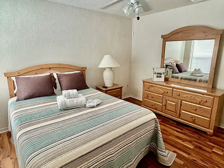 2nd Bedroom Queen Bed Dresser and Nightstand, with wall mounted 30 inch TV