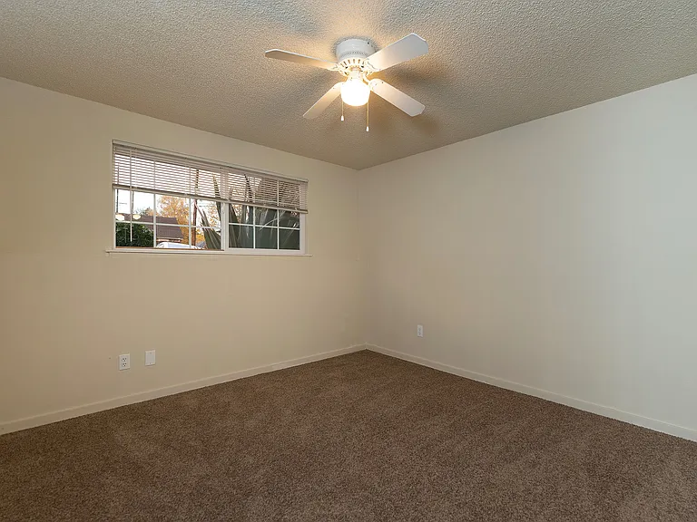 Experience the comfort of a well-lit, spacious bedroom that's perfect for relaxation. Experience the comfort of a well-lit, spacious bedroom that's perfect for relaxation.