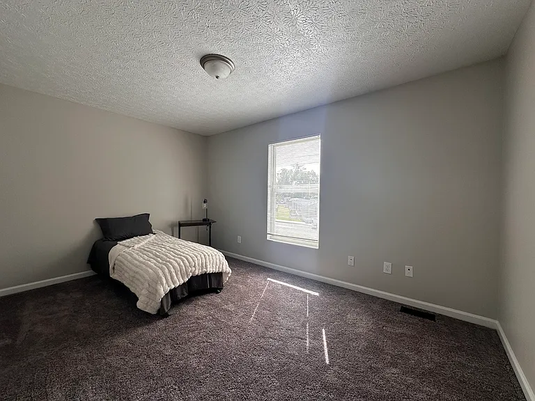 Bedroom one - new carpet and freshly painted