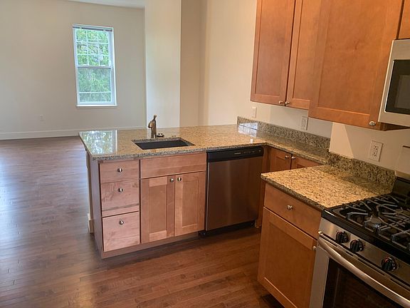 Kitchen/Dining area next to front entrance. Granite countertops!