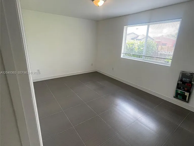 545 NW 121st St — Photo 9