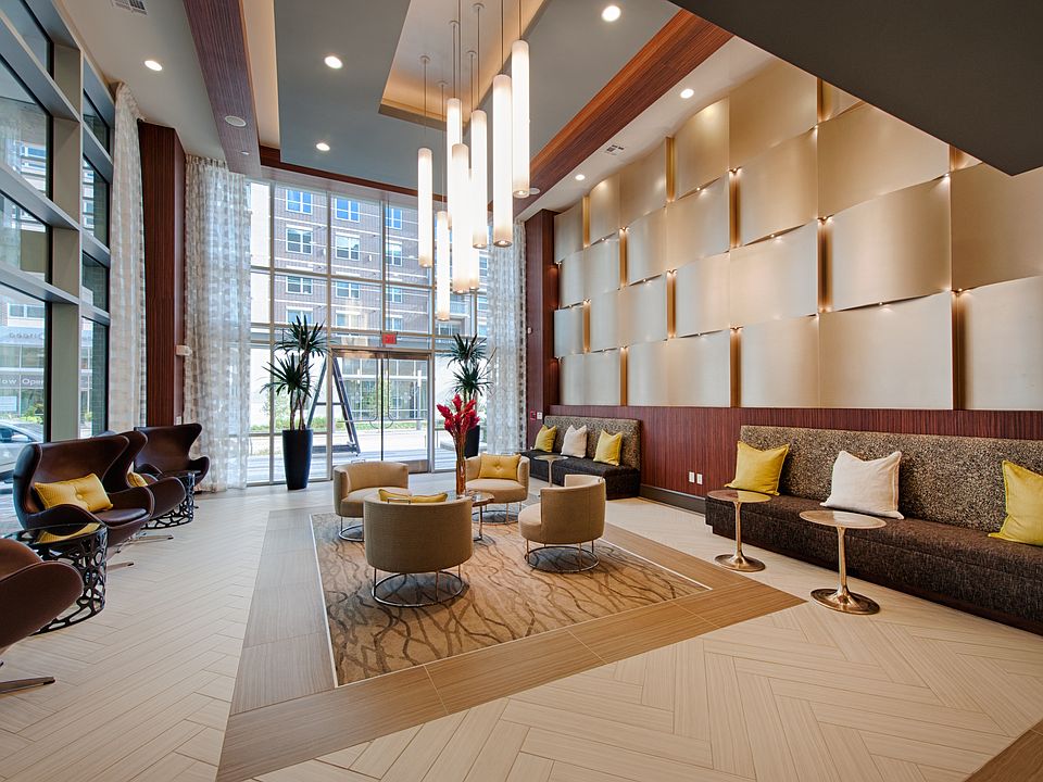 Contemporary lobby space with warm, neutral tones.