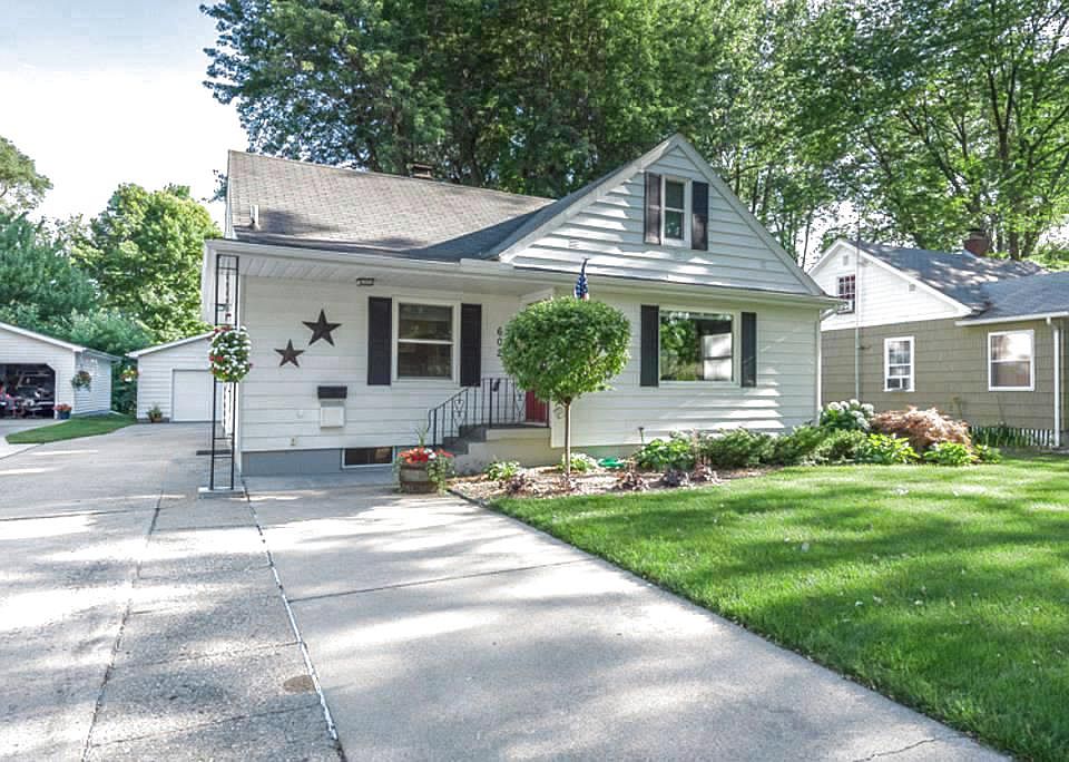 Charming and well maintained, centrally located 3 Bedroom, 2 Full Bath, Story and a Half in a great neighborhood just waiting for new owners.  Freshly painted where needed and some new flooring add up to move-in ready.  Finished living space in the basement, including a kitchenette. Beautifully landscaped yard. Plenty of storage in the basement and 2.5 car garage. Central Air.