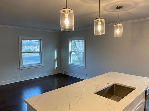 Partial view of the living room from the kitchen. Kitchen faucet will be installed in April. Pictures will be updated once installed.