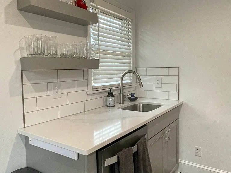 New Kitchen Granite Countertops and Subway Tile, Dishwasher, SimpleHuman Recycle & Trash. New Luxury Vinyl Tile Flooring.