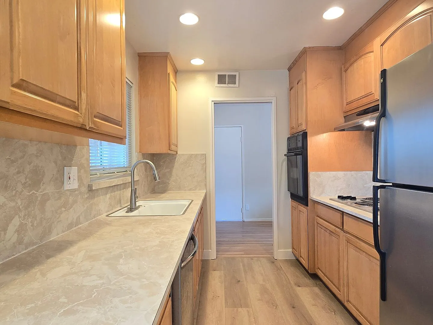 Spacious Split Level Home, Wood Floors, Fresh Paint, Nice Backyard, Great Location! — Photo 2