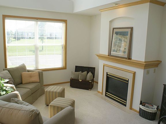 Tons of Windows and Natural Light-Cozy Gas Fireplace-Two Story Vault-WOW!