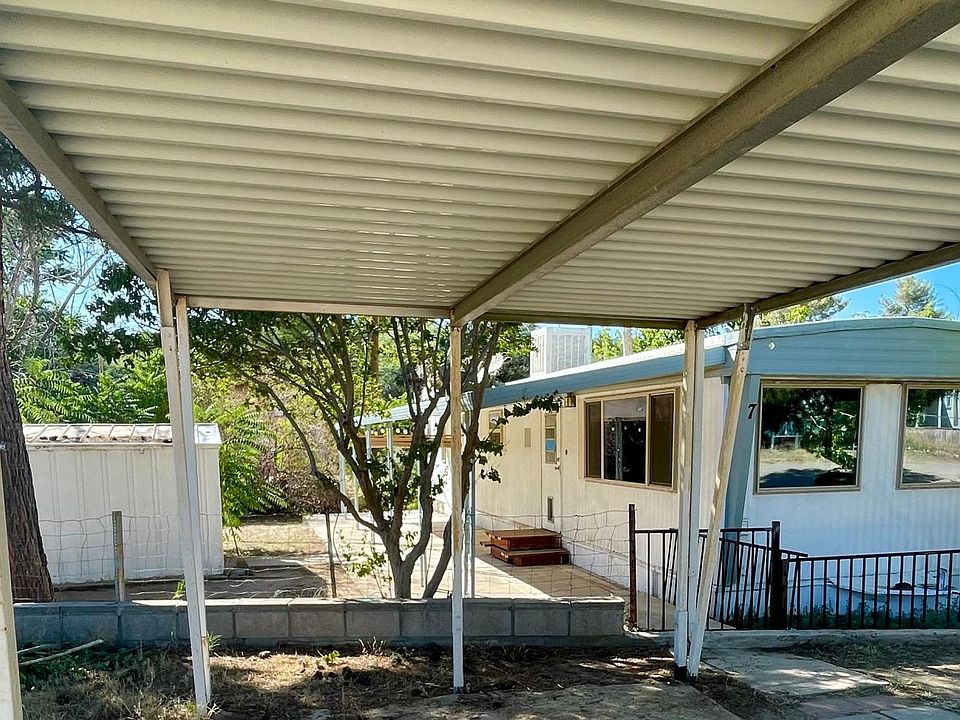 Front of home. Car port in front of home