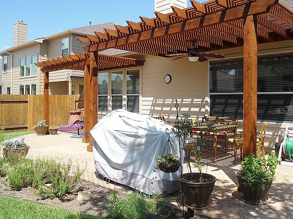 Huge patio & 2 wood pergolas
