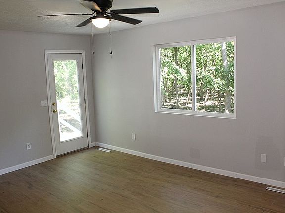 Master bedroom w/ patio door