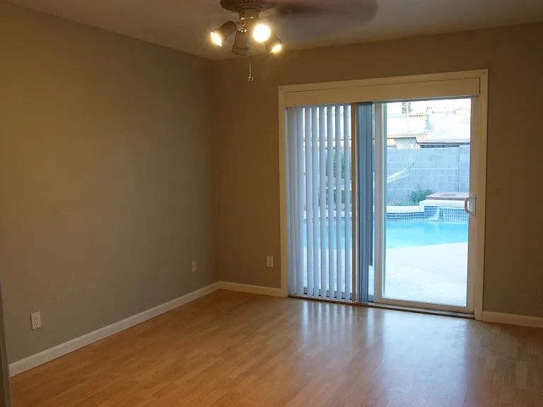 Master Bedroom... sliding door leads to pool and spa