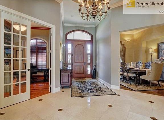 Elegant entry featuring beautiful marble floors.