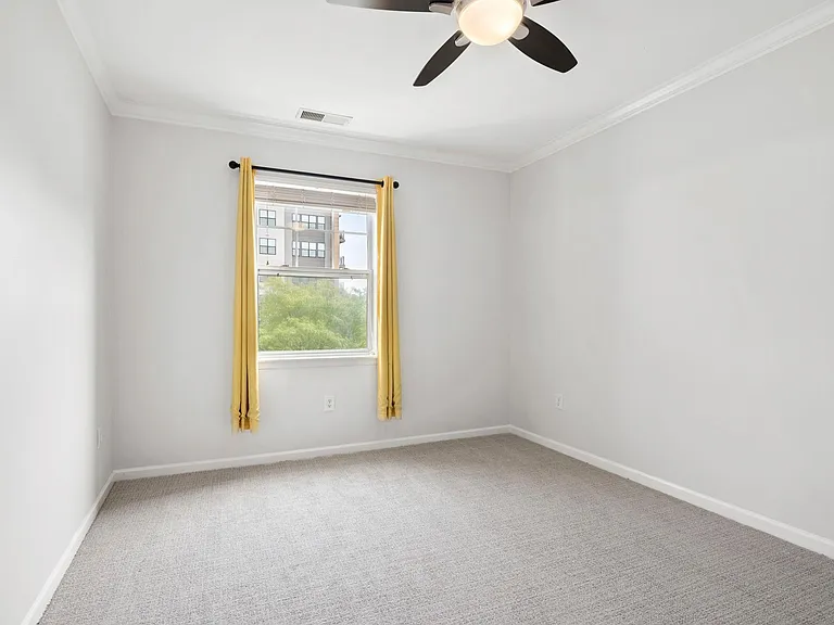 Main bedroom. Curtains are optional.