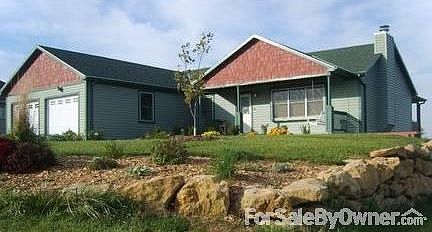 Family Home, Great Location : Welcoming front walk leads to covered patio with porch a swing.