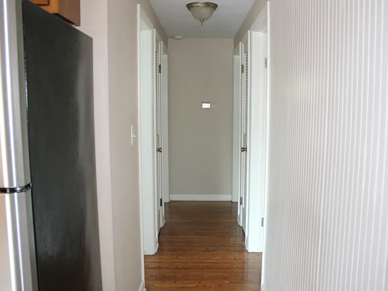 Hallway Leading From Kitchen to Bedrooms/Bathroom