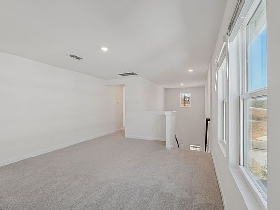 Loft in the Vienna floorplan at a Meritage Homes community in Charlotte, NC.